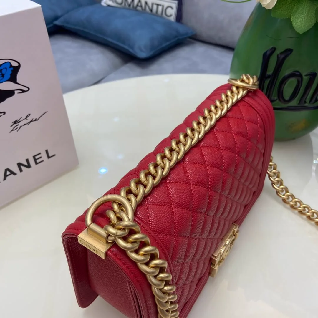 Reference image illustrating Replica Chanel Boy Bag in Red Calfskin and Gold-Tone Metal (A67086 Style)