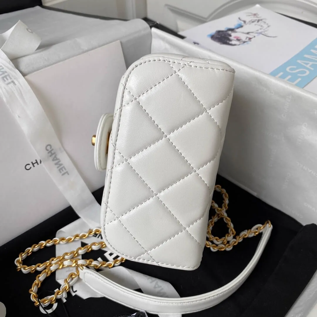 Reference image illustrating Replica Chanel 23S Handle Cosmetic Bag in White Lambskin – Style AS3973