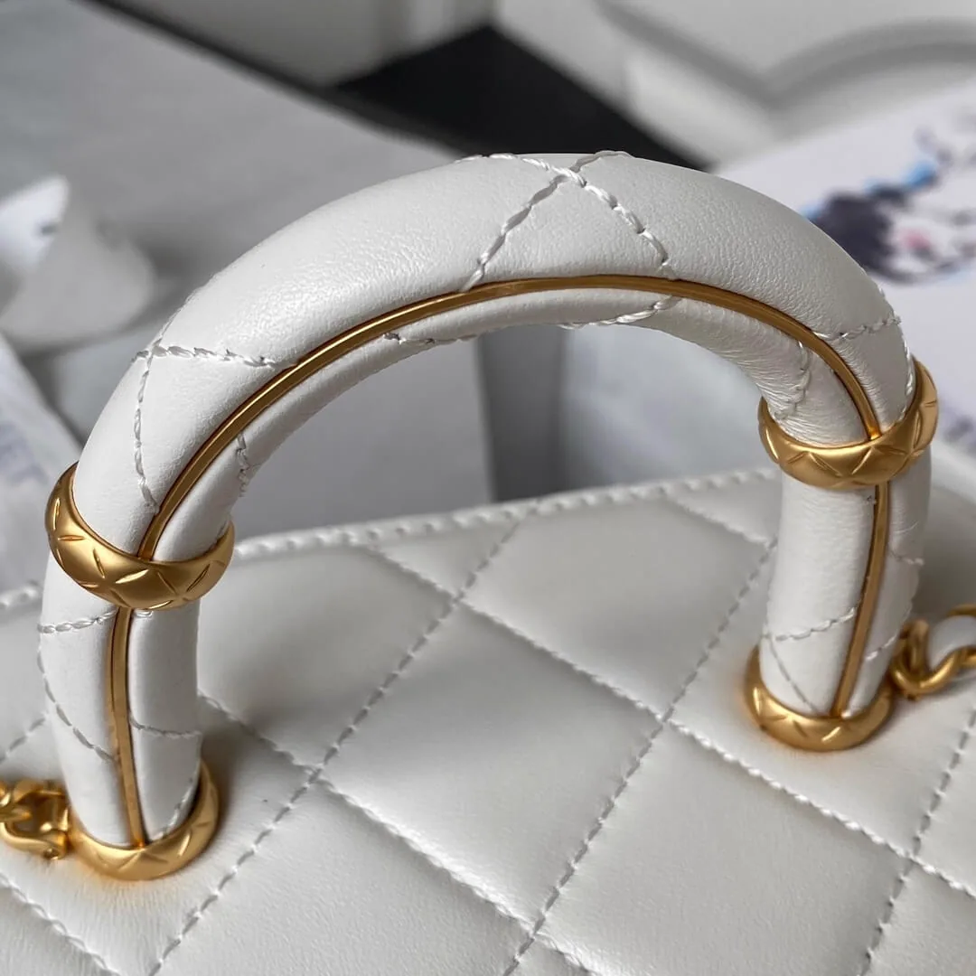 Reference image illustrating Replica Chanel 23S Handle Cosmetic Bag in White Lambskin – Style AS3973