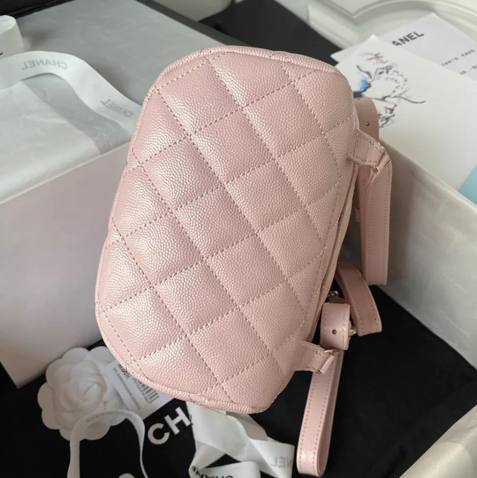 Reference image illustrating Replica Chanel Backpack AS4058 Light Pink Grained Calfskin Gold-Tone Metal