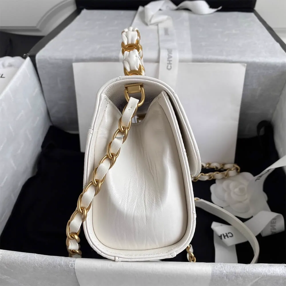 Reference image illustrating Replica CHANEL Mini Flap Bag with Top Handle – White Lambskin (Style AS2477)