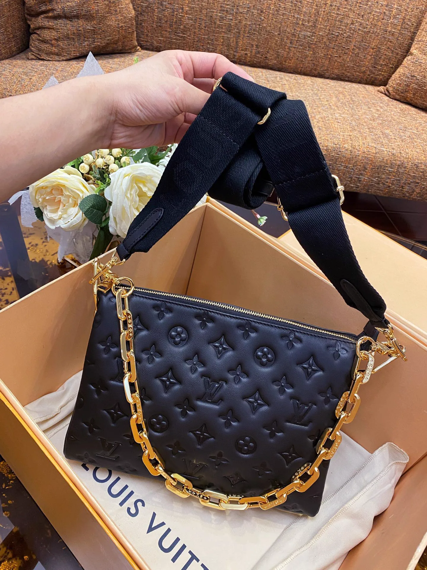 Reference image illustrating Replica Louis Vuitton Coussin Bag: Design, History, and Styling Guide