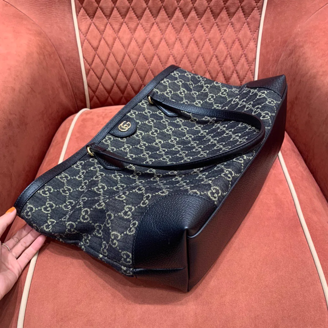 Reference image illustrating Replica Gucci Denim Tote Bag – Iconic Bucket Silhouette in Blue Denim
