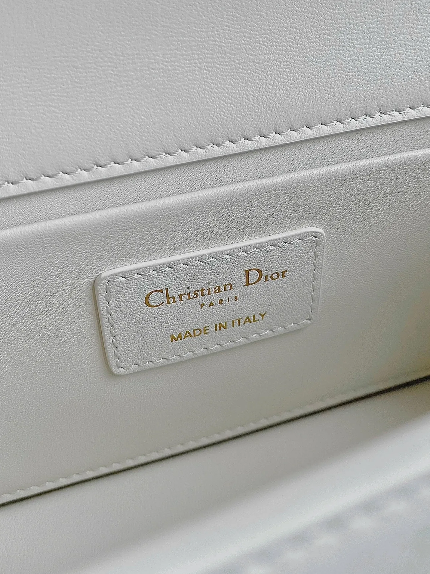 Reference image illustrating Replica Dior 30 Montaigne East-West Bag with Chain in White Calfskin