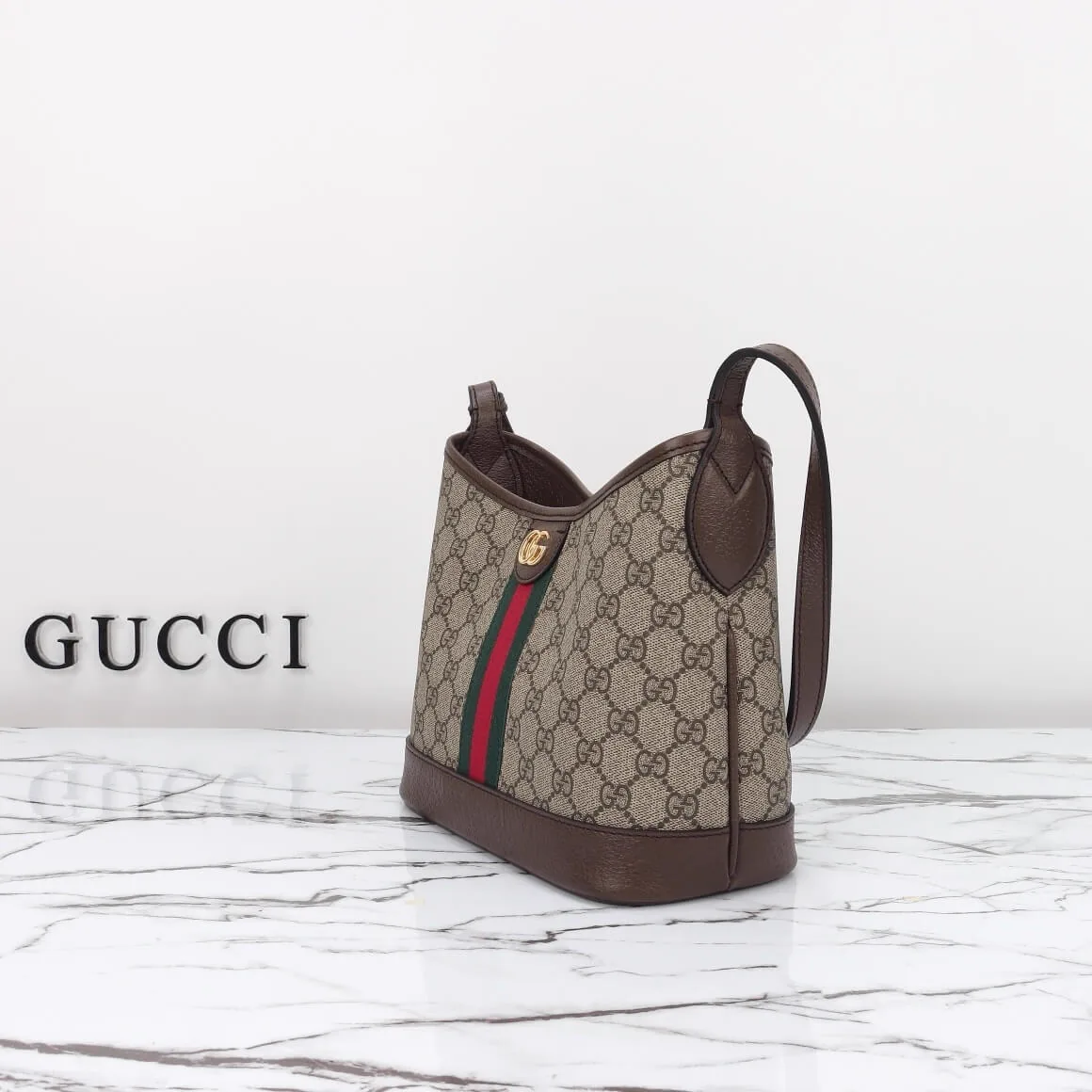 Reference image illustrating Replica Gucci Ophidia GG Small Shoulder Bag – Design, History & Style Guide