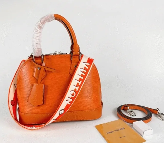 Replica Louis Vuitton Epi Leather Alma BB Handbag in Orange with Jacquard Strap thumbnail