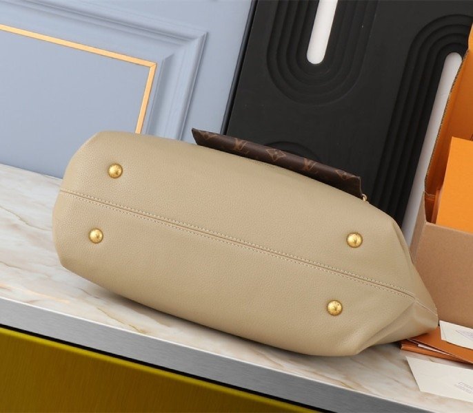 Reference image illustrating Replica Louis Vuitton Low Key Cabas MM Bag in Galet Gray – Design & Style Guide