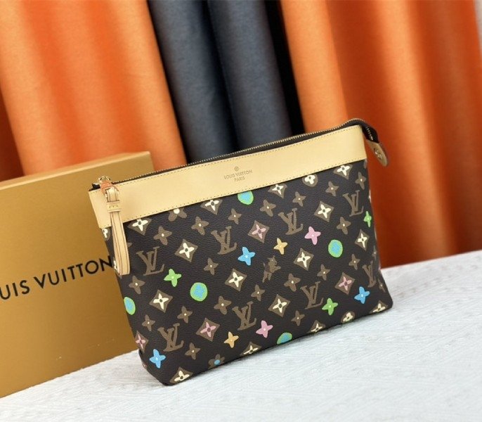 Reference image illustrating Replica Louis Vuitton Monogram Craggy Voyage Souple Pochette in Chocolate – Design & Style Guide