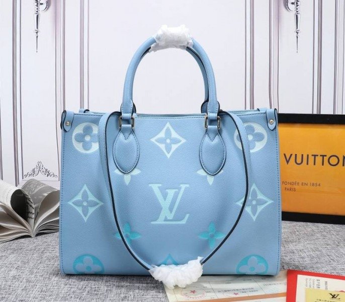 Replica Louis Vuitton Monogram Empreinte Onthego MM Bag in Summer Blue – Design & Style Guide thumbnail