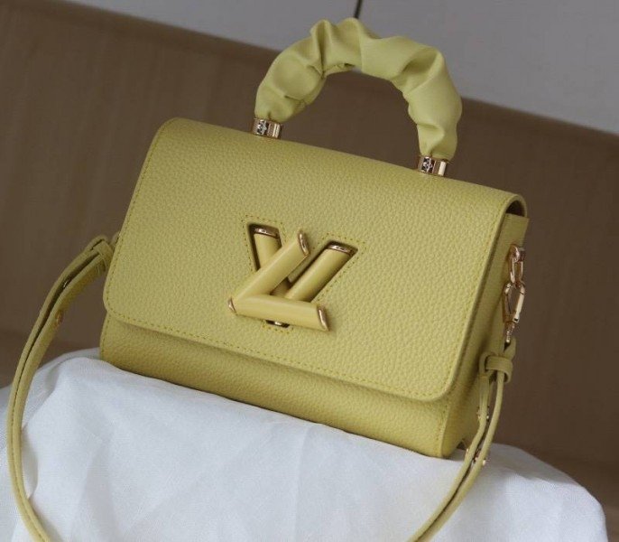 Replica Louis Vuitton Twist MM Scrunchie Handle in Ginger Yellow Taurillon Leather thumbnail