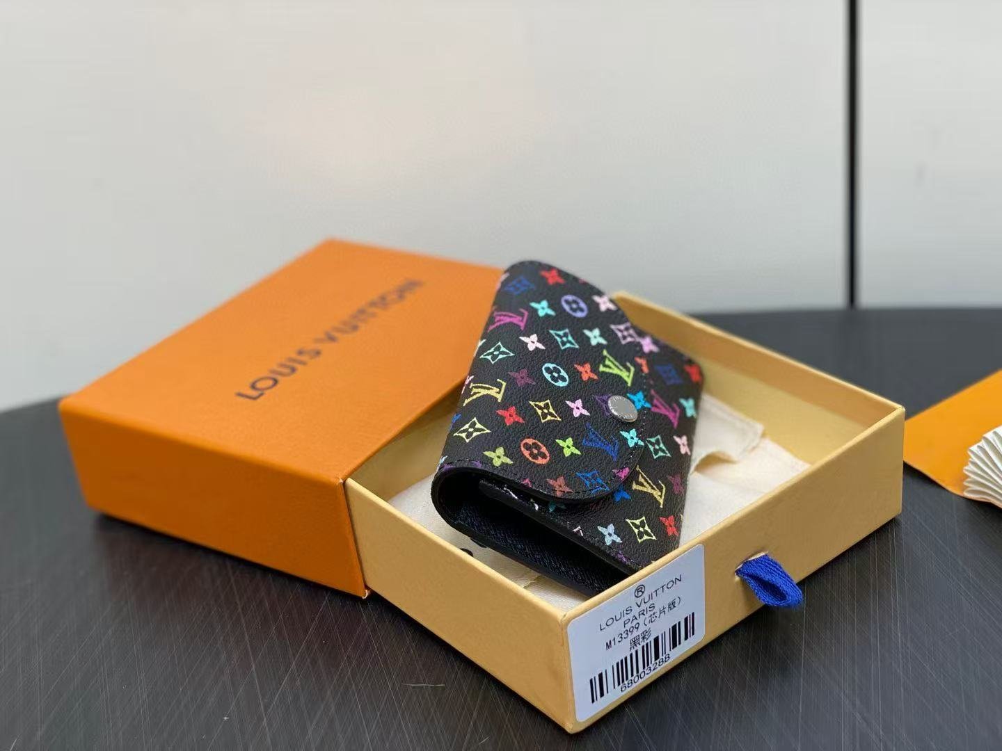 Reference image illustrating Replica Louis Vuitton x Takashi Murakami Rosalie Coin Purse – Iconic Collaboration Design