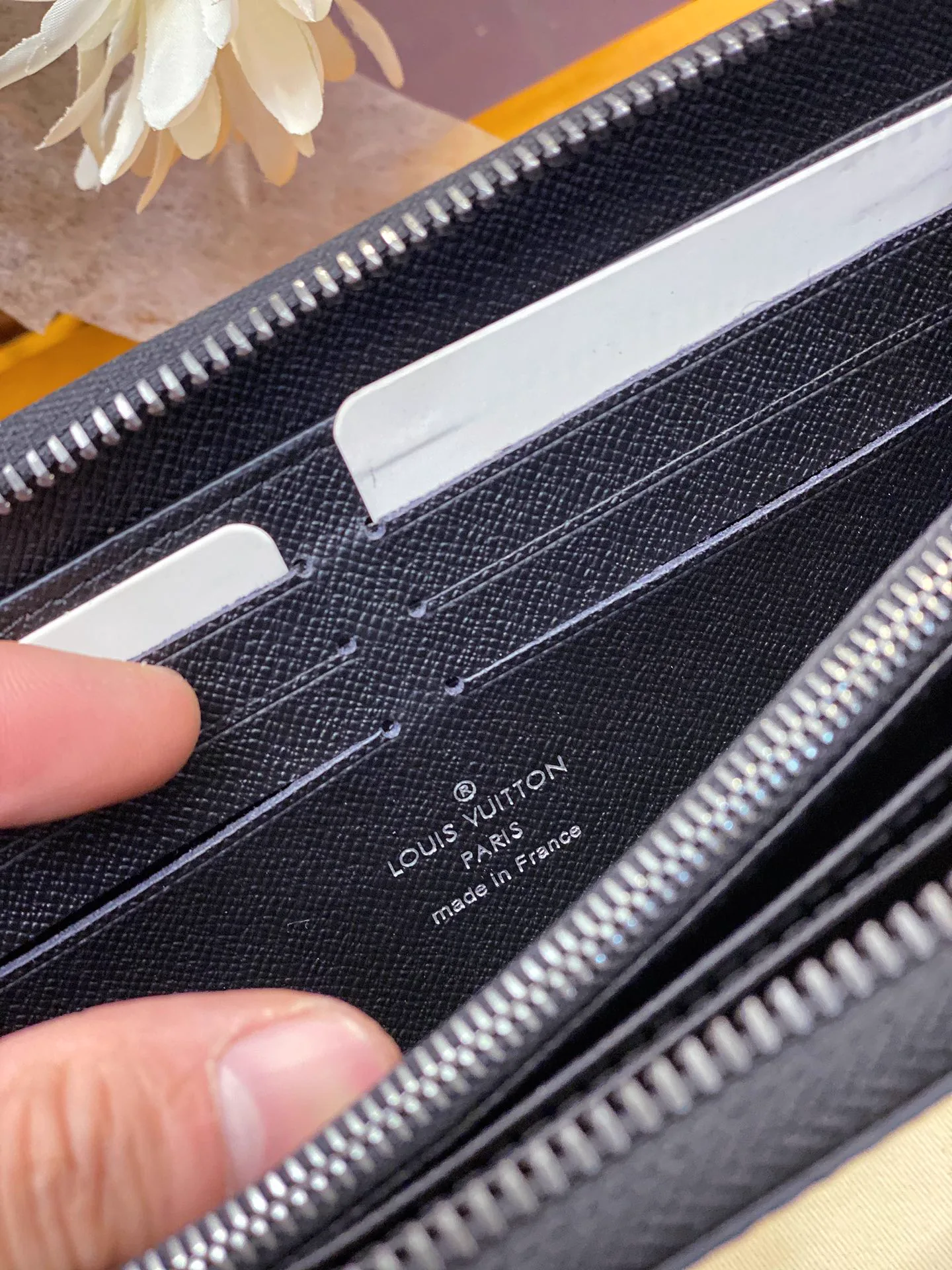 Reference image illustrating Replica Louis Vuitton Monogram Canvas Zippy Wallet: A Detailed Style Guide
