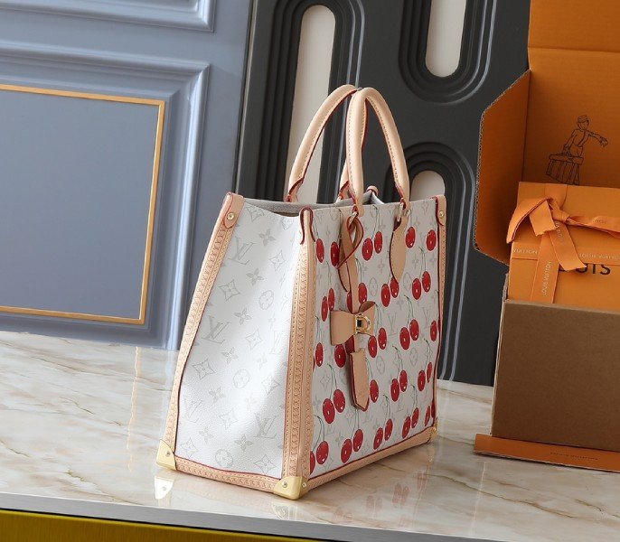 Reference image illustrating Replica LV x TM Monogram Cherry Canvas Onthego MM in White Style 25201