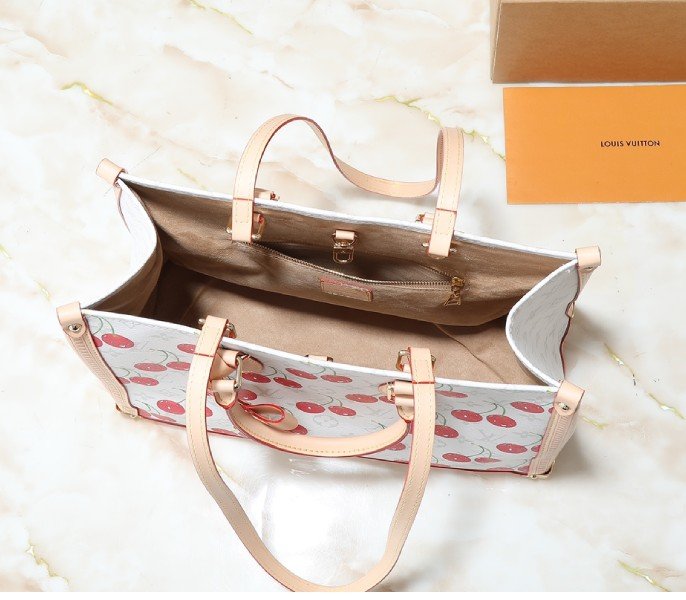 Reference image illustrating Replica LV x TM Monogram Cherry Canvas Onthego MM in White Style 25201