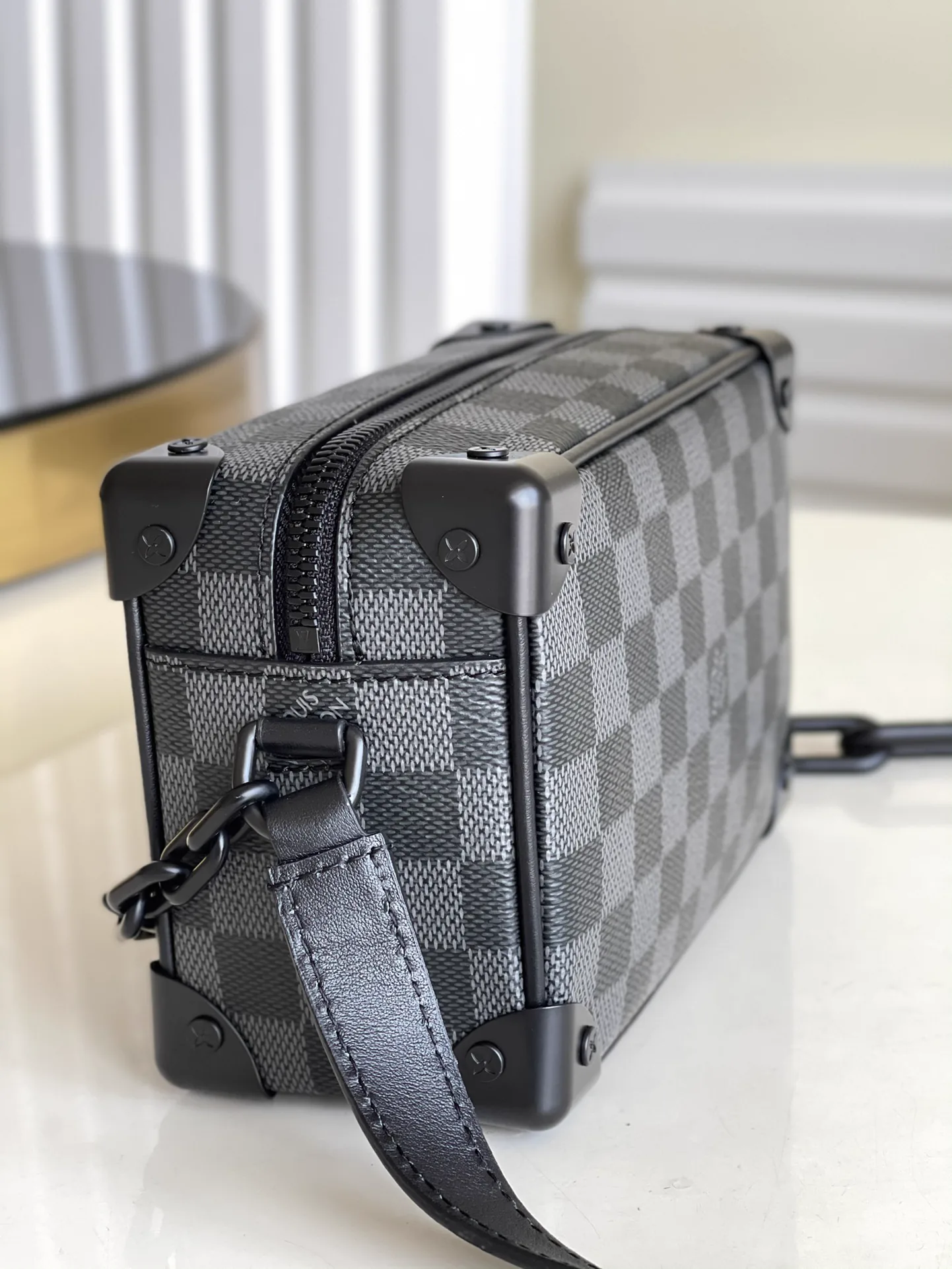 Reference image illustrating Replica Louis Vuitton Mini Soft Trunk Monogram Canvas Crossbody Bag (Style M44480)