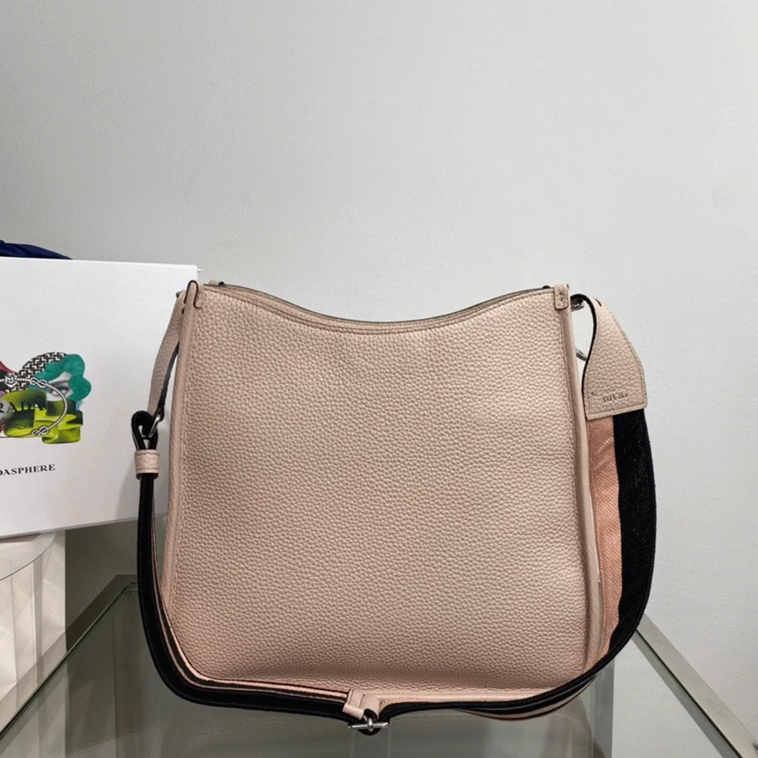 Reference image illustrating Replica Prada Re-Edition 2005 Hobo Bag in Sand – A Detailed Style Guide