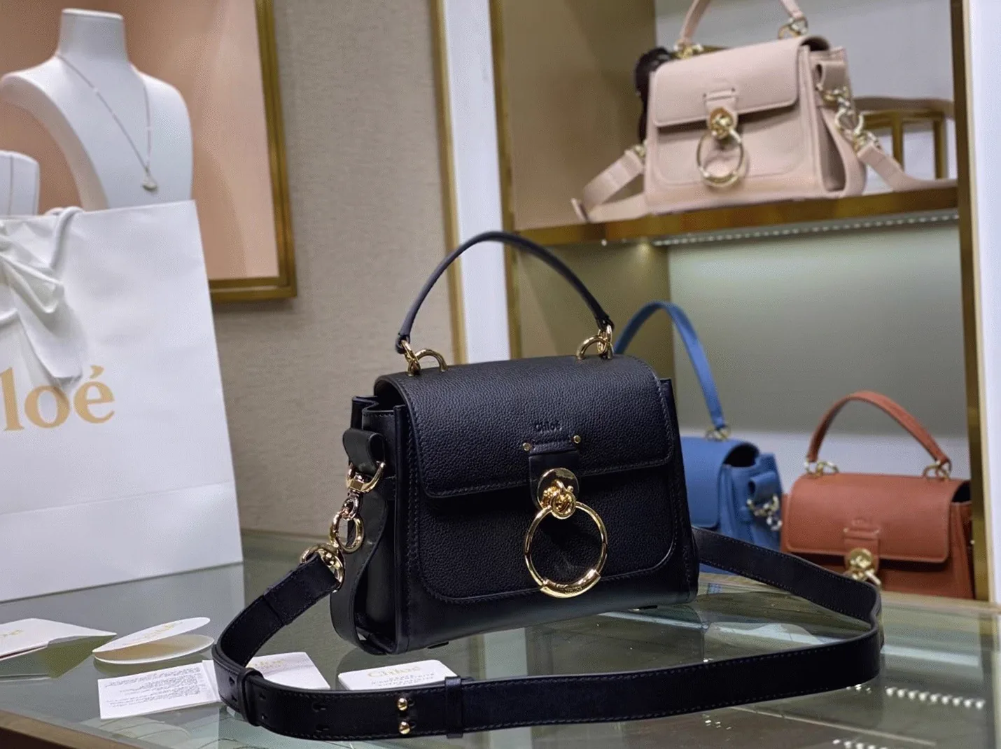 Reference image illustrating Replica Chloe Mini Tess Day Bag in Black Grained Leather – A Detailed Style Guide