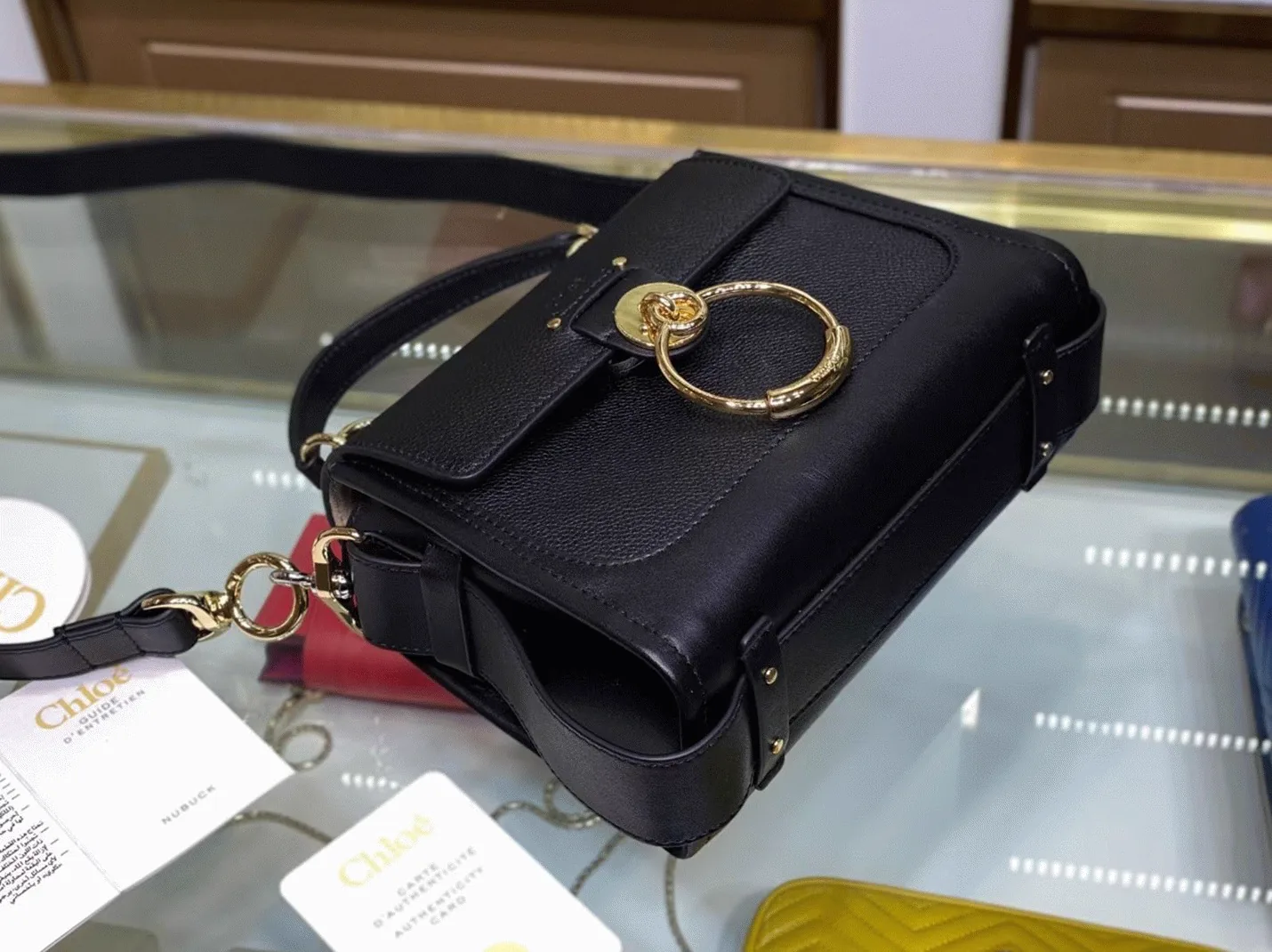 Reference image illustrating Replica Chloe Mini Tess Day Bag in Black Grained Leather – A Detailed Style Guide