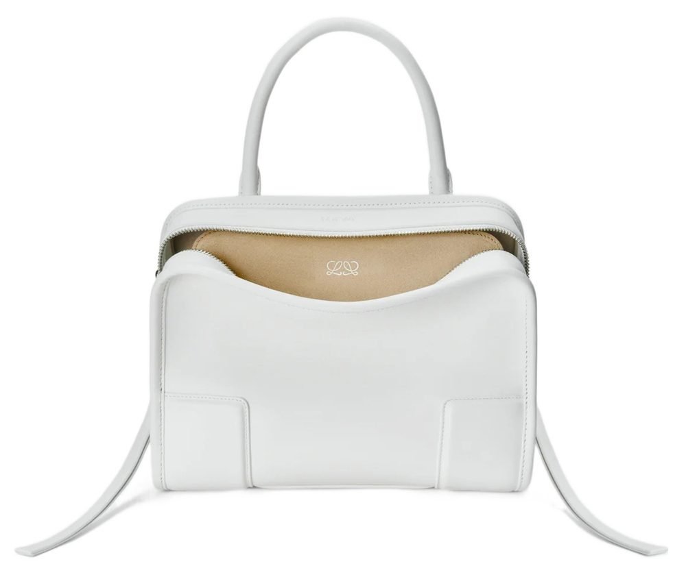 Reference image illustrating 6 Stunning White Handbags to Carry This Summer 2026