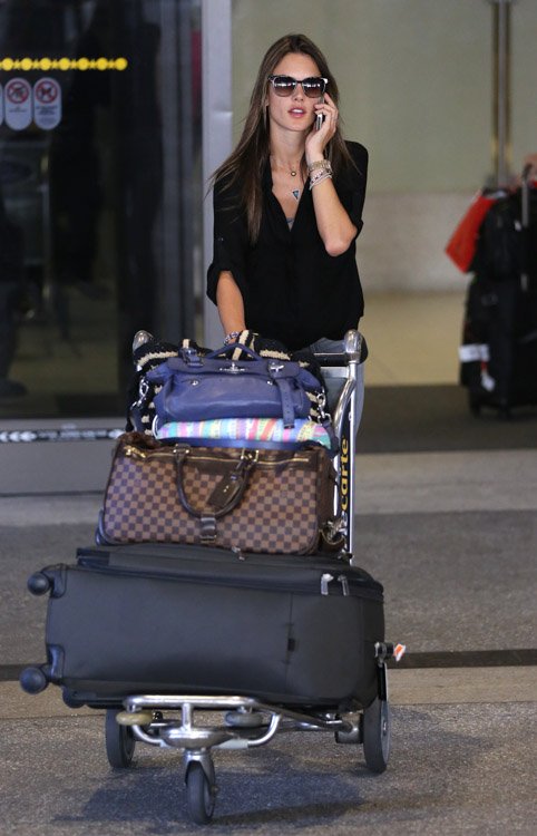 Reference image illustrating Alessandra Ambrosio's Handbag Collection: From Airport Travel Bags to Chanel Classics