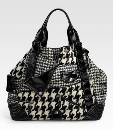 Reference image illustrating Alexander McQueen Houndstooth Tote Review: A Bold Pattern That Misses the Mark
