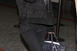 Reference image illustrating Ashley Olsen Uses The Row Day Luxe Tote as a Carry-On and Paparazzi Shield