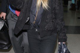 Reference image illustrating Ashley Olsen Uses The Row Day Luxe Tote as a Carry-On and Paparazzi Shield