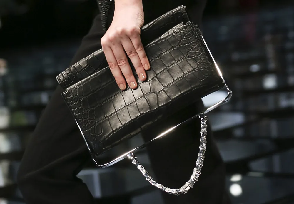 Reference image illustrating Balenciaga Spring 2015: Alexander Wang’s Refined Exotic Clutch and Top-Handle Hybrids