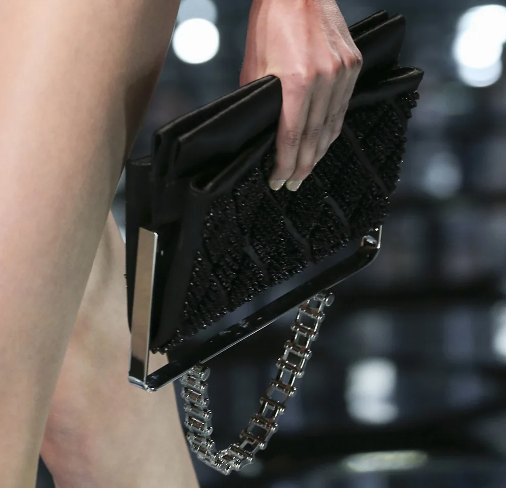 Reference image illustrating Balenciaga Spring 2015: Alexander Wang’s Refined Exotic Clutch and Top-Handle Hybrids