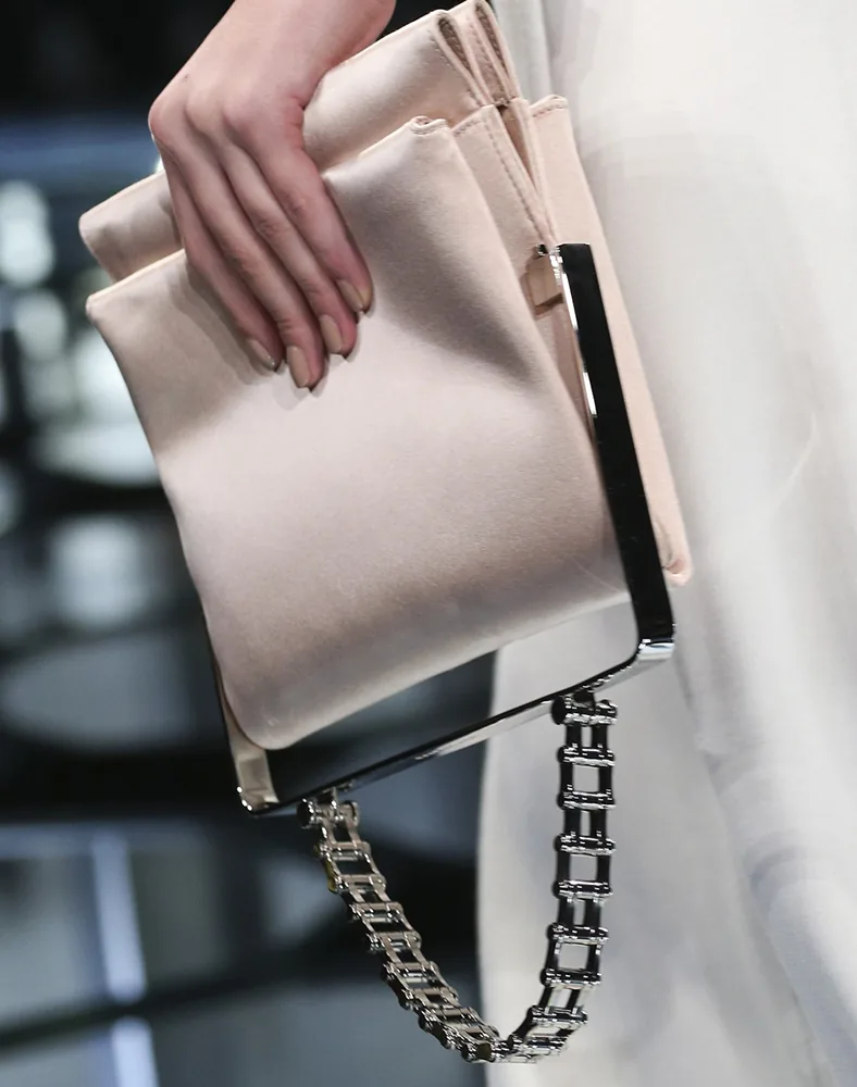 Reference image illustrating Balenciaga Spring 2015: Alexander Wang’s Refined Exotic Clutch and Top-Handle Hybrids