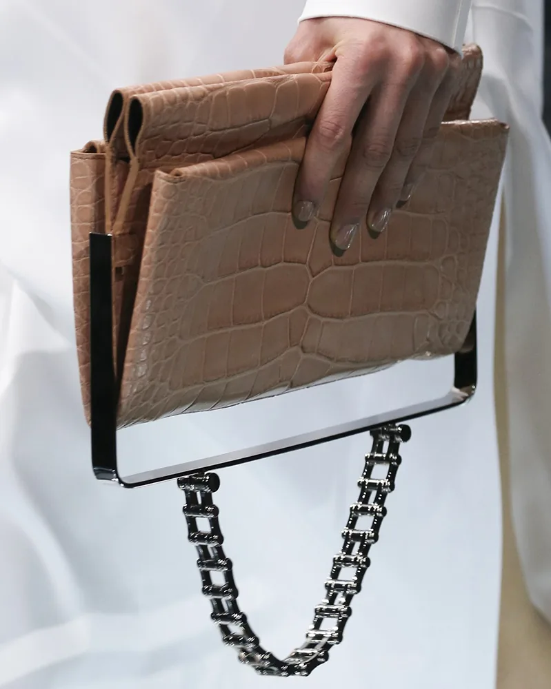 Reference image illustrating Balenciaga Spring 2015: Alexander Wang’s Refined Exotic Clutch and Top-Handle Hybrids