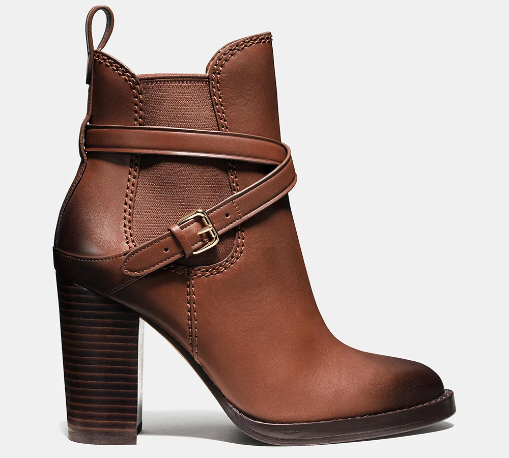 Reference image illustrating Block-Heel Ankle Boots: The Fall 2026 Footwear Investment for Luxury Handbag Lovers