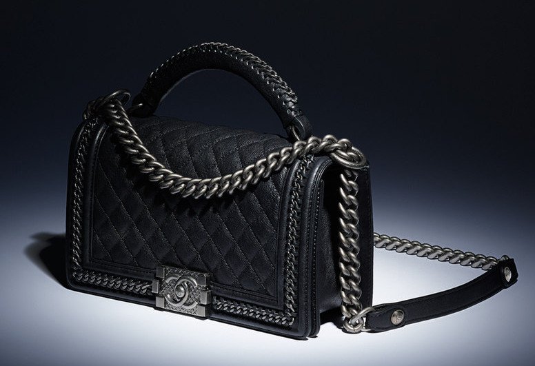 Reference image illustrating Chanel Boy Bag with Handle: A Detailed Look at the Top Handle Addition