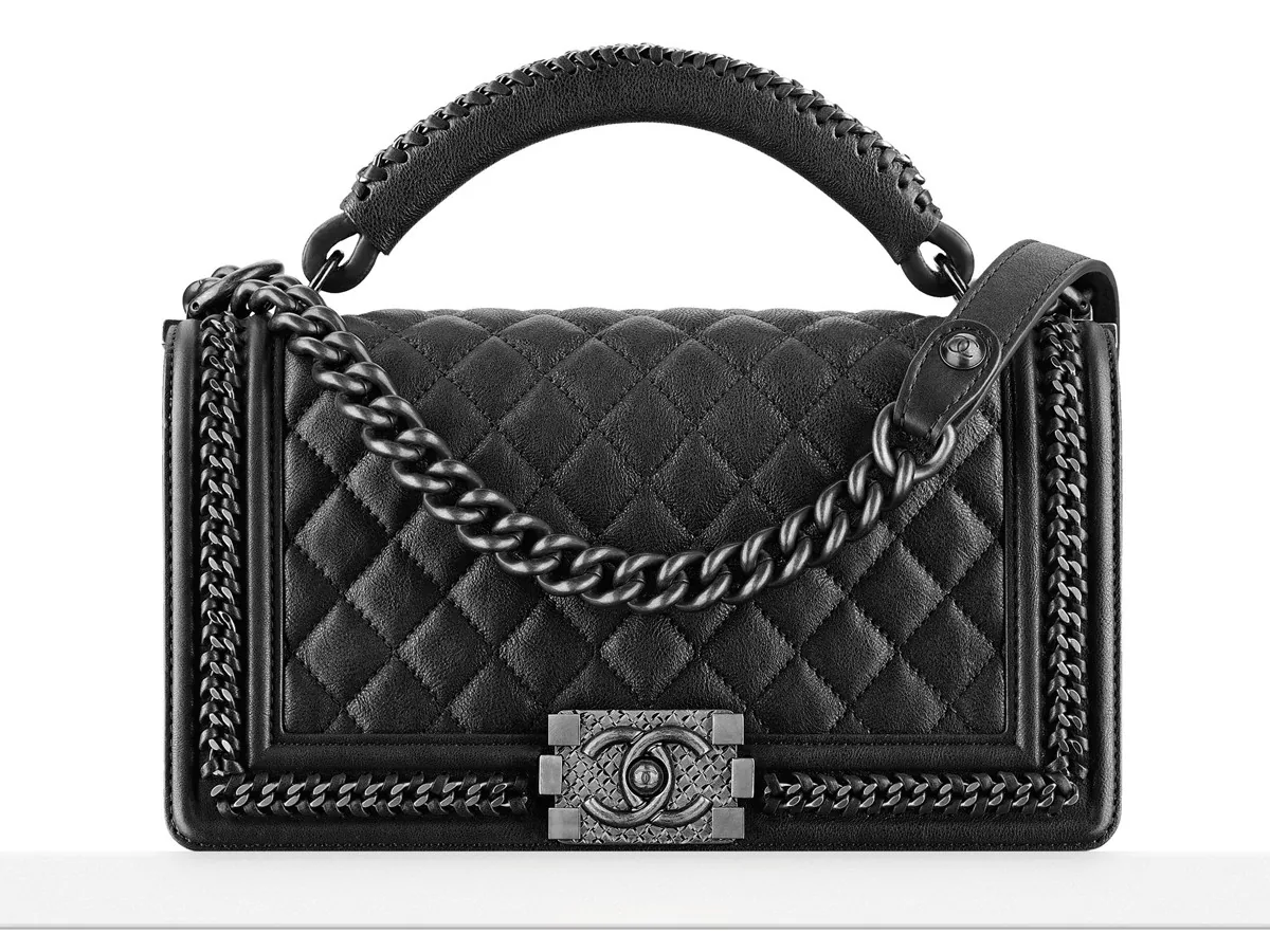 Reference image illustrating Chanel Boy Bag with Handle: A Detailed Look at the Top Handle Addition