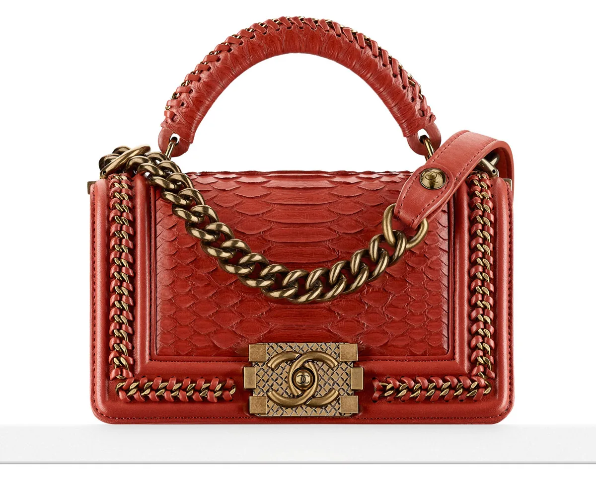 Reference image illustrating Chanel Boy Bag with Handle: A Detailed Look at the Top Handle Addition