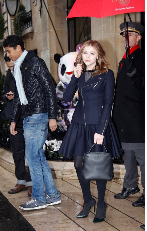 Reference image illustrating Chloë Grace Moretz Carries a Rare Dior Spring 2013 Runway Tote to Haute Couture