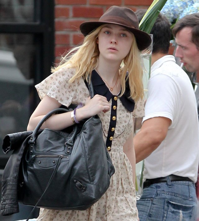 Reference image illustrating Dakota Fanning’s Handbag Collection: A Study in Understated Luxury