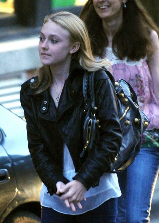 Reference image illustrating Dakota Fanning’s Handbag Collection: A Study in Understated Luxury