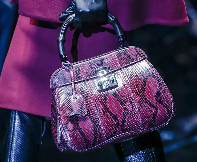 Reference image illustrating Gucci Fall 2013: Matte Black Bamboo Handles Get a Modern Makeover