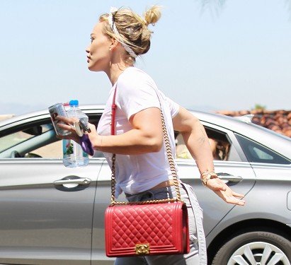 Hilary Duff Adds a Cherry Red Chanel Boy Bag to Her Coveted Collection thumbnail