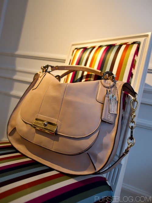 Reference image illustrating Inside Vanessa Flaherty's Coach Handbag: A Classic Legacy Lining Reveal