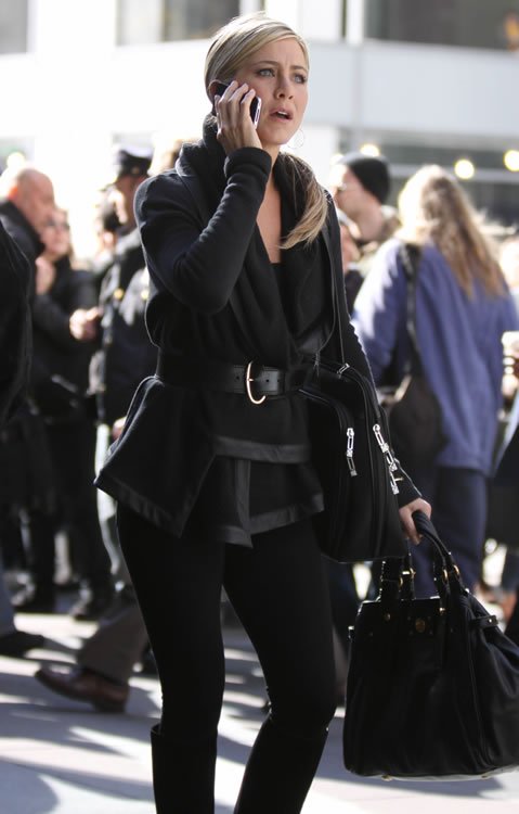 Reference image illustrating Jennifer Aniston's Handbag Collection: Tom Ford, Bottega Veneta & More