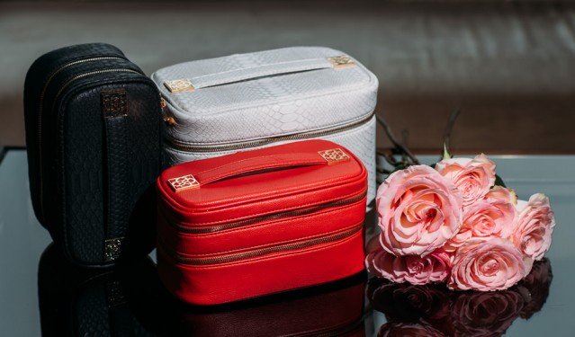 Kendra Scott Beauty Bags: Faux Python Train Cases and Cosmetic Organizers for Holiday Gifting thumbnail