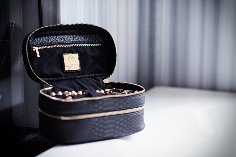 Reference image illustrating Kendra Scott Beauty Bags: Faux Python Train Cases and Cosmetic Organizers for Holiday Gifting