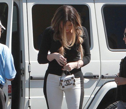 Khloe Kardashian Spotted Filming with a Petite Chanel Lego Mini Flap Bag thumbnail