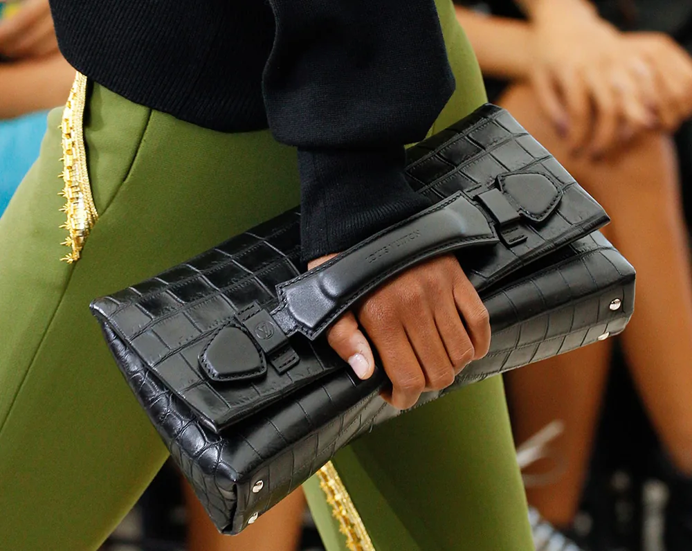 Reference image illustrating Louis Vuitton Spring 2017 Runway: New Bag Styles and a Petite Malle iPhone Case