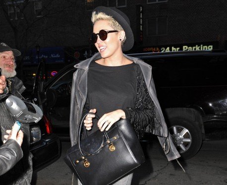Miley Cyrus Spotted in NYC with the Versace Signature Tote: A Bold Street Style Moment thumbnail