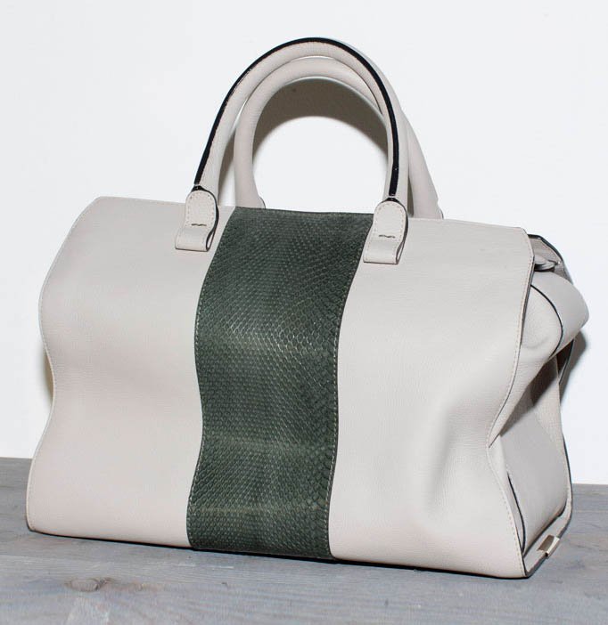Reference image illustrating Victoria Beckham Fall 2012 Handbags: A Masterclass in Minimalist Luxury