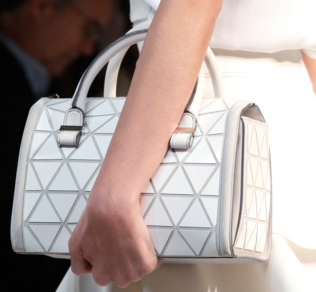 Reference image illustrating Victoria Beckham Spring 2014 Handbags: Petite Duffels and Triangular Prints