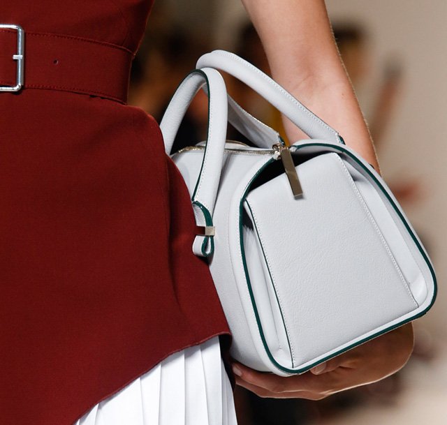 Reference image illustrating Victoria Beckham Spring 2014 Handbags: Petite Duffels and Triangular Prints